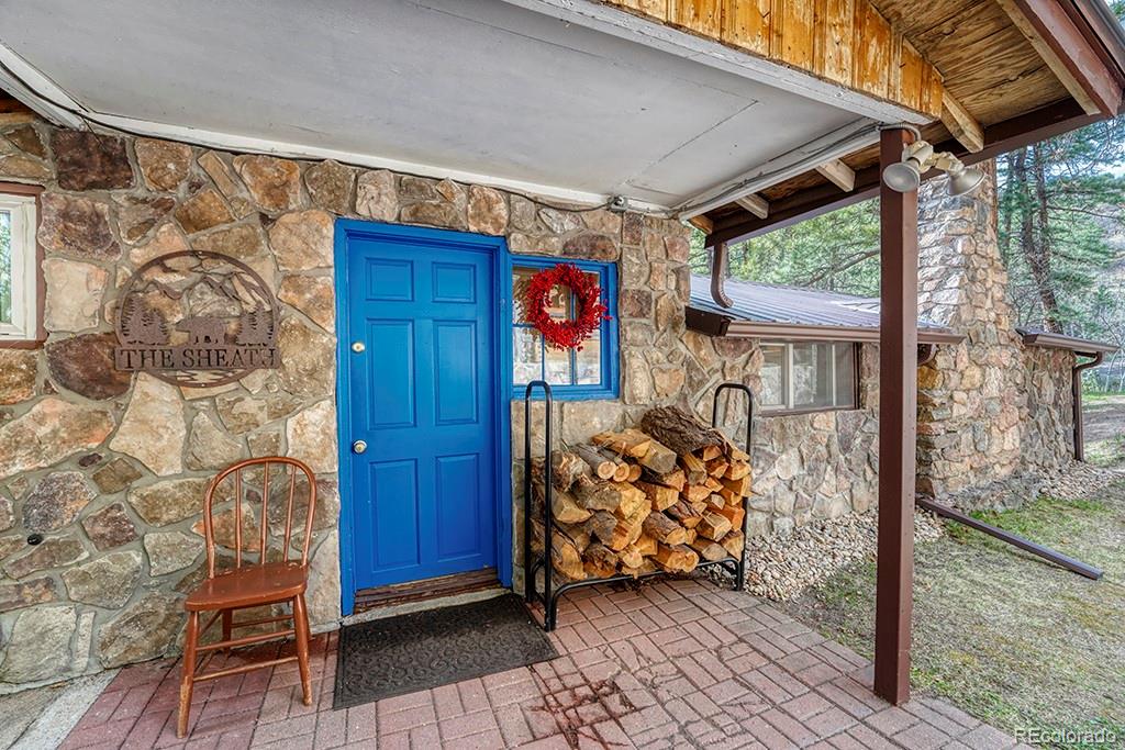 9088 South Murphy Gulch Road Littleton, CO 80127 - Photo 5 of 50 a view of front door of house