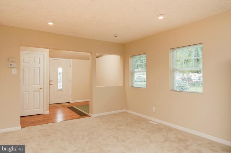 1319 3rd Road Baltimore, MD 21220 - Photo 18 of 29 an empty room with windows and closet