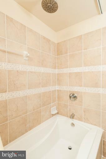 1319 3rd Road Baltimore, MD 21220 - Photo 3 of 29 a bathroom with a bathtub