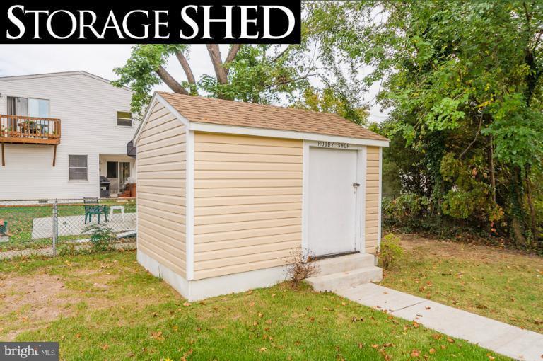 1319 3rd Road Baltimore, MD 21220 - Photo 23 of 29 a view of a house with a yard and sitting area