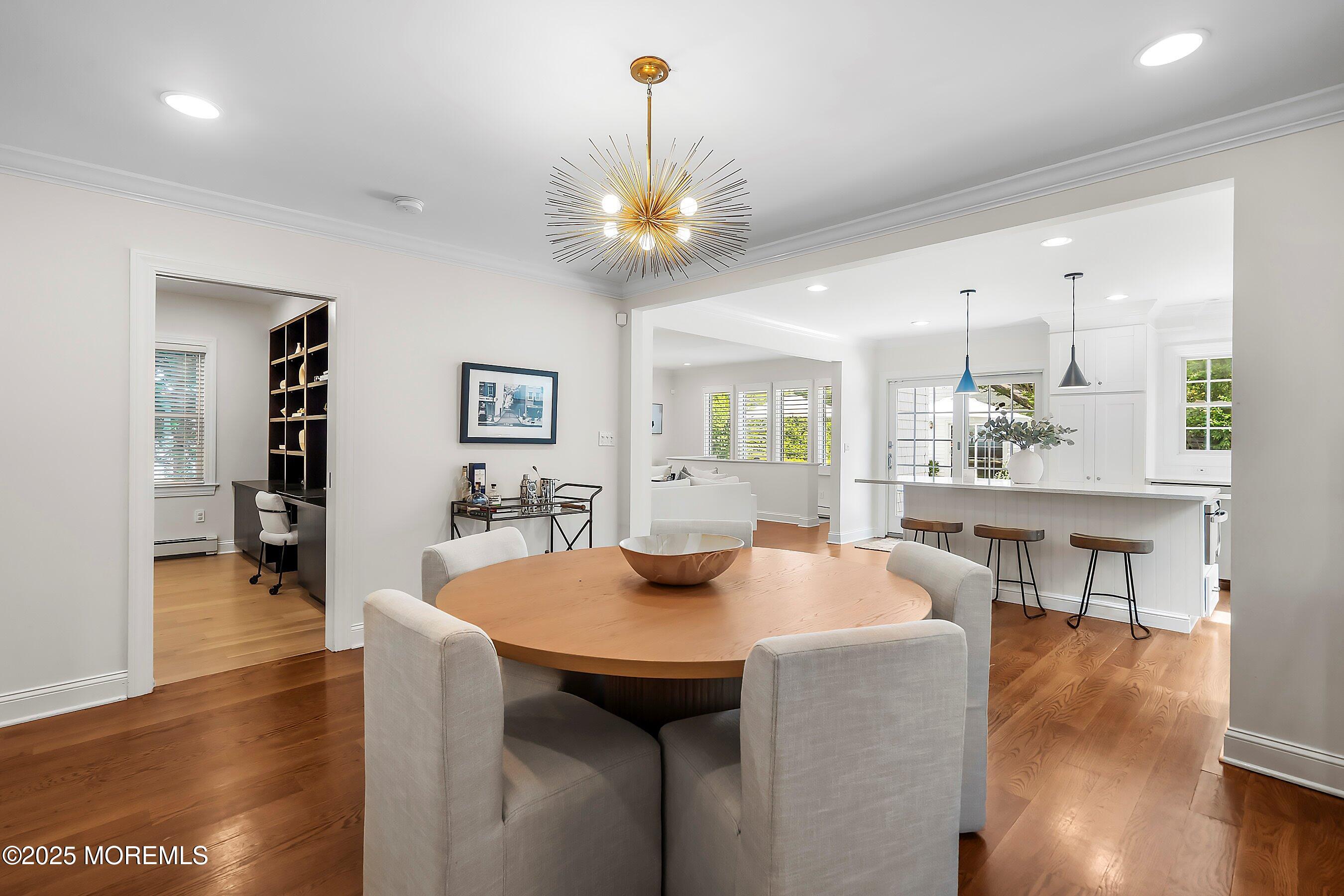 44 Ridge Road Rumson, NJ 07760 - Photo 12 of 38 a view of a dining room with furniture and wooden floor