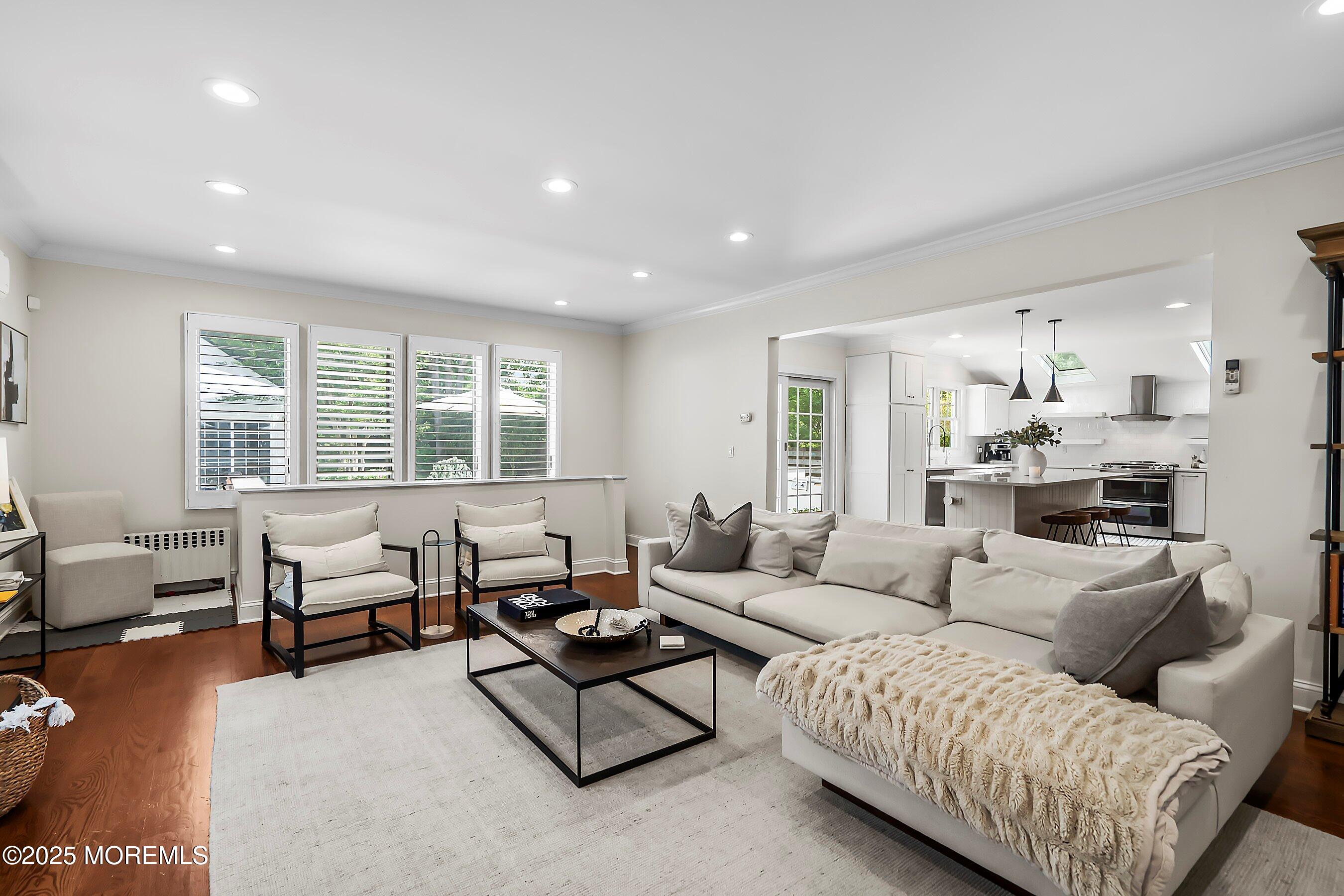 44 Ridge Road Rumson, NJ 07760 - Photo 15 of 38 a living room with furniture and a large window