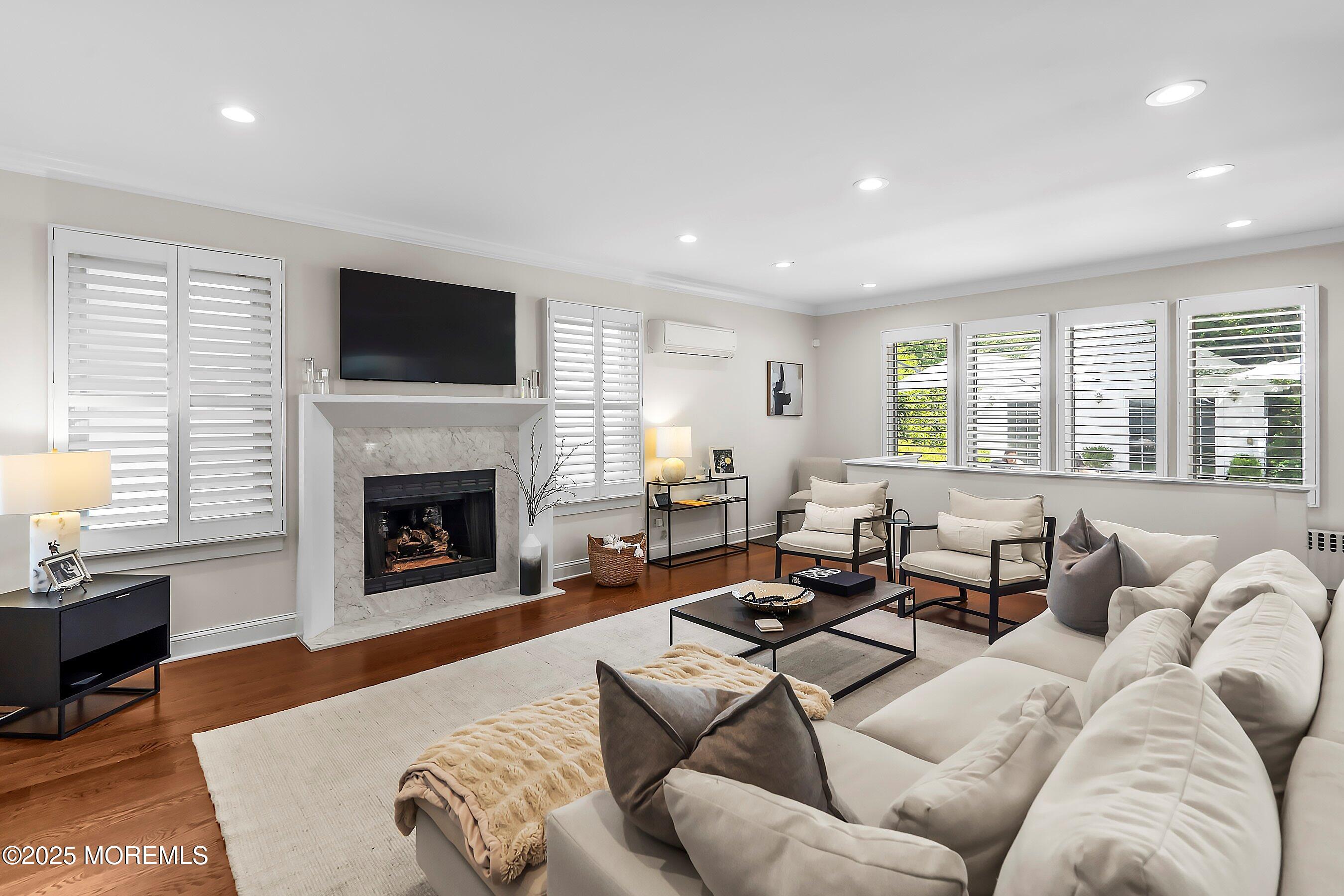 44 Ridge Road Rumson, NJ 07760 - Photo 16 of 38 a living room with furniture fireplace and window