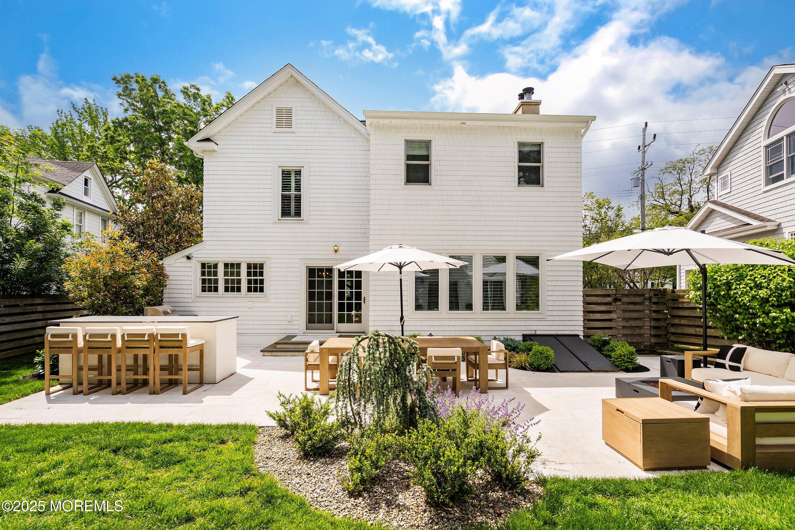44 Ridge Road Rumson, NJ 07760 - Photo 19 of 38 a front view of a house with patio