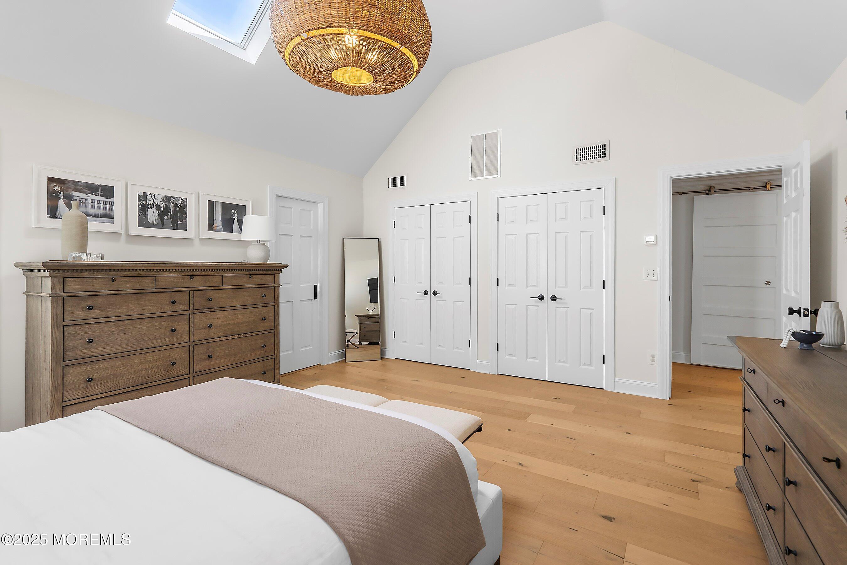 44 Ridge Road Rumson, NJ 07760 - Photo 23 of 38 a bedroom with a bed and a dresser