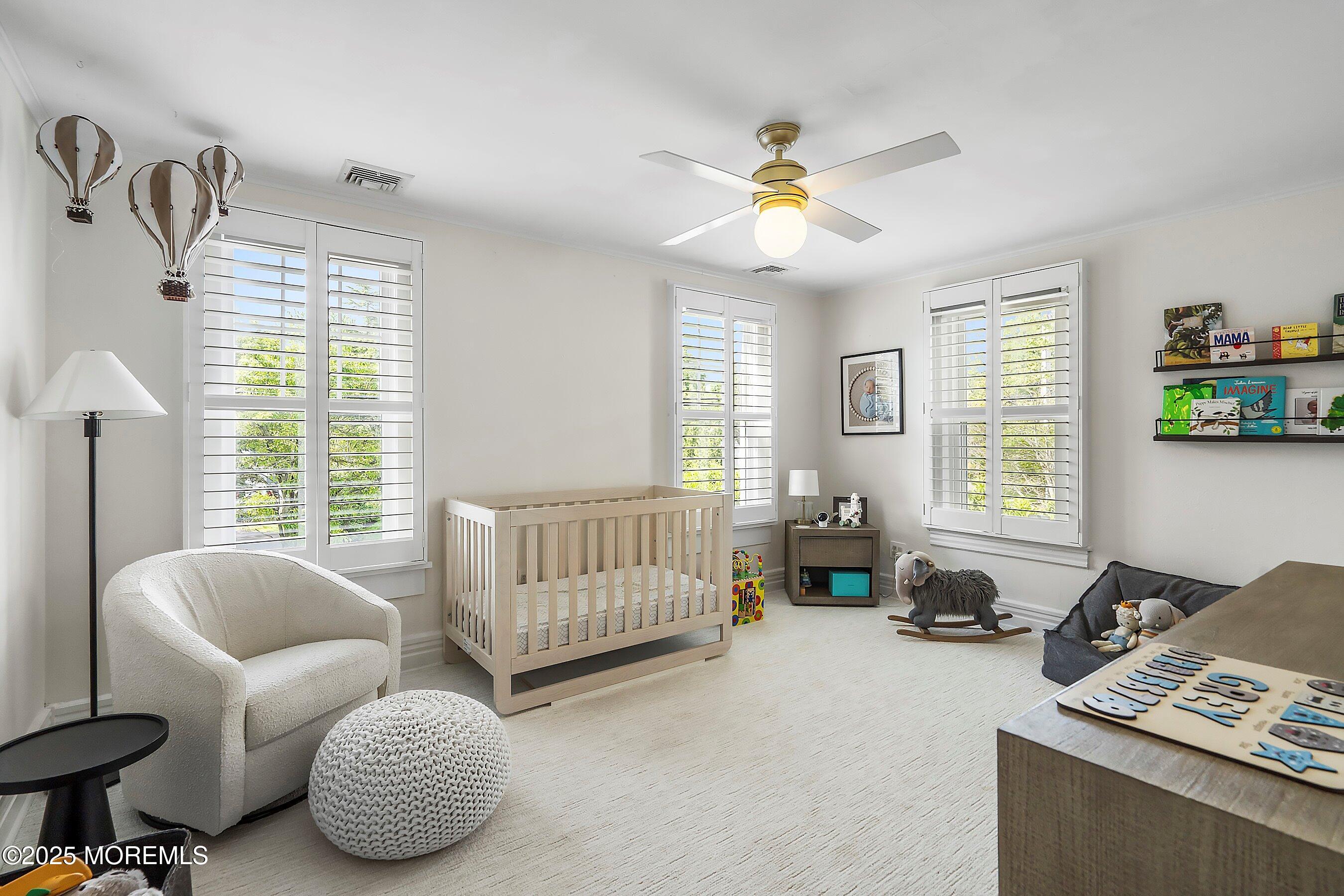 44 Ridge Road Rumson, NJ 07760 - Photo 26 of 38 a bedroom with furniture and a large window