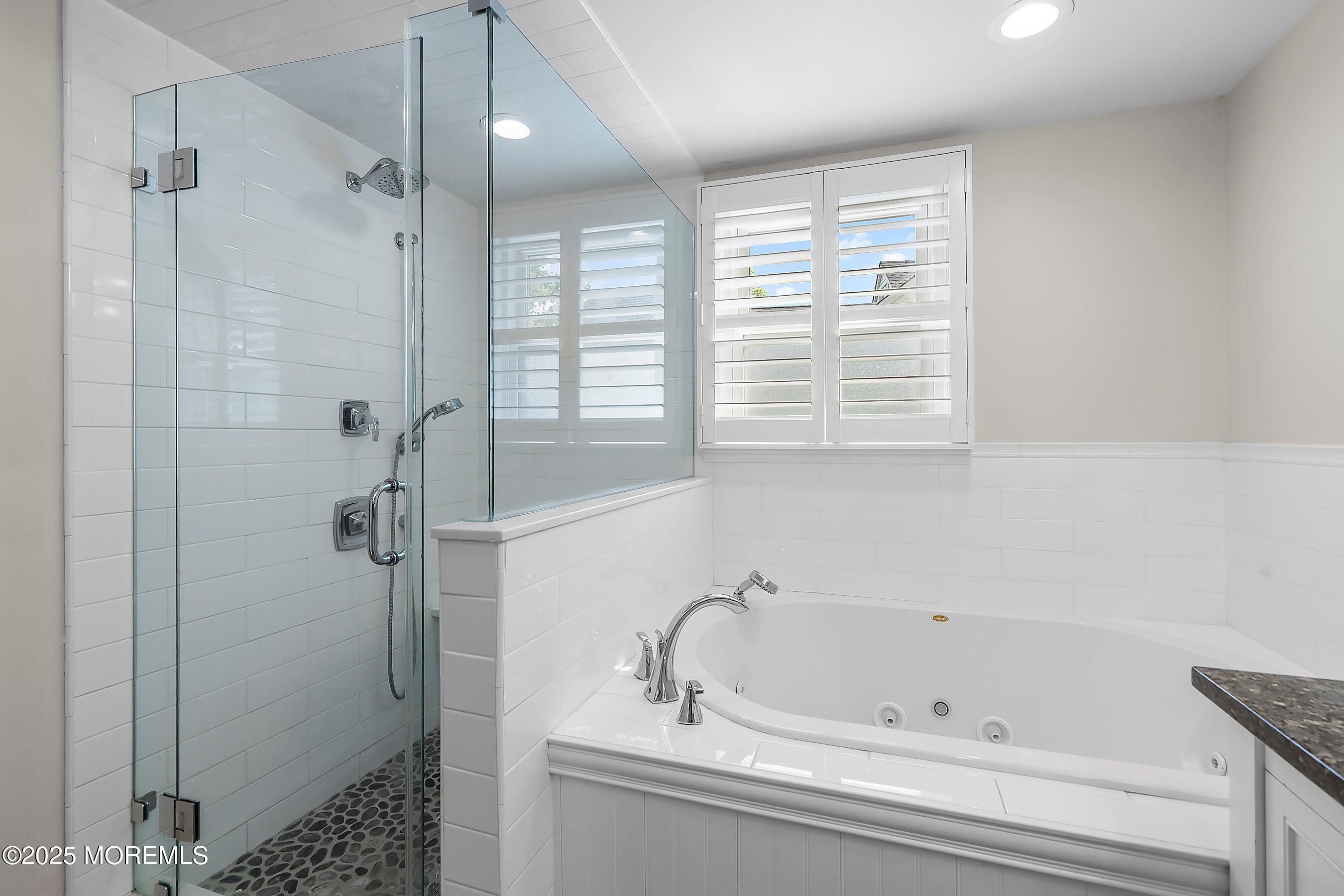 44 Ridge Road Rumson, NJ 07760 - Photo 29 of 38 a bathroom with a bathtub and a shower