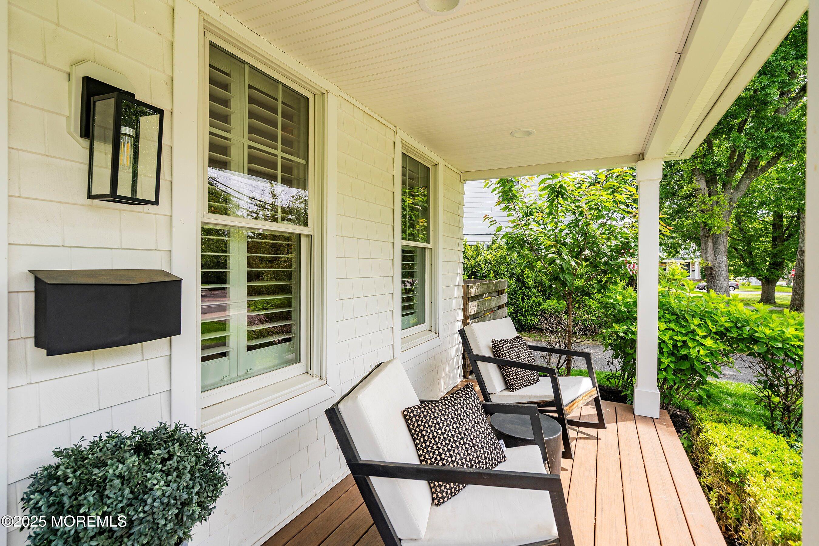 44 Ridge Road Rumson, NJ 07760 - Photo 2 of 38 a view of a house with backyard and sitting area