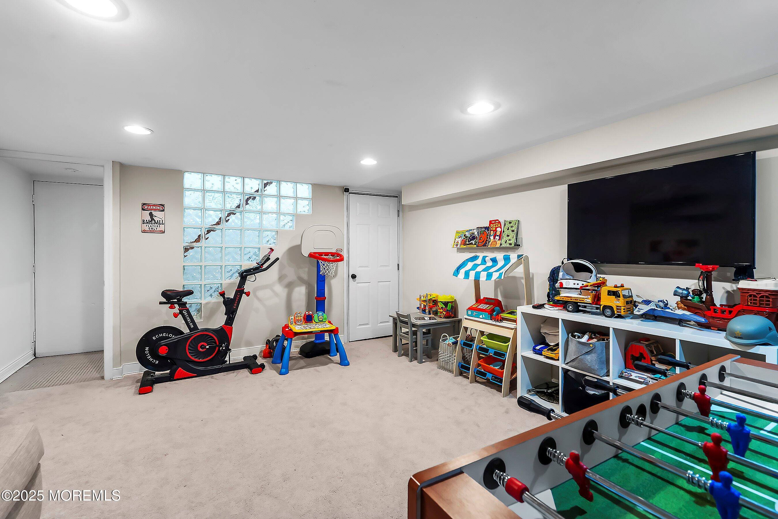 44 Ridge Road Rumson, NJ 07760 - Photo 36 of 38 a room with toys and bicycles