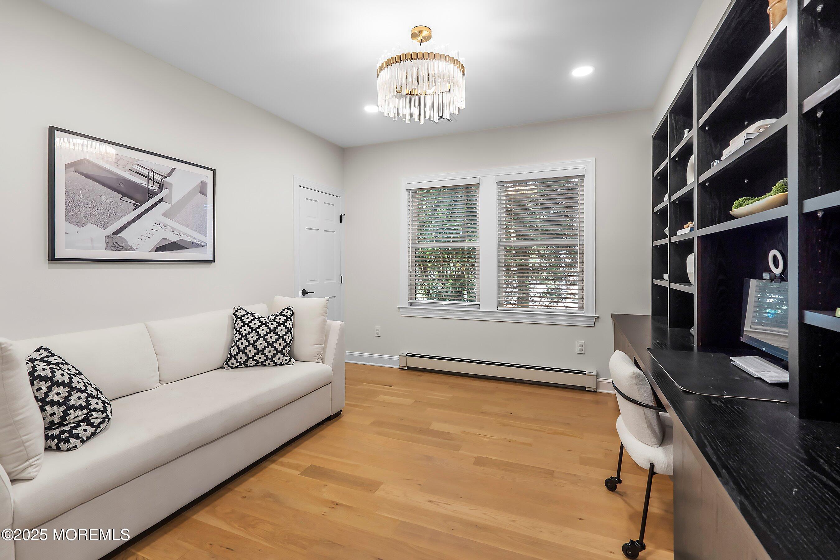44 Ridge Road Rumson, NJ 07760 - Photo 5 of 38 a living room with furniture and a window
