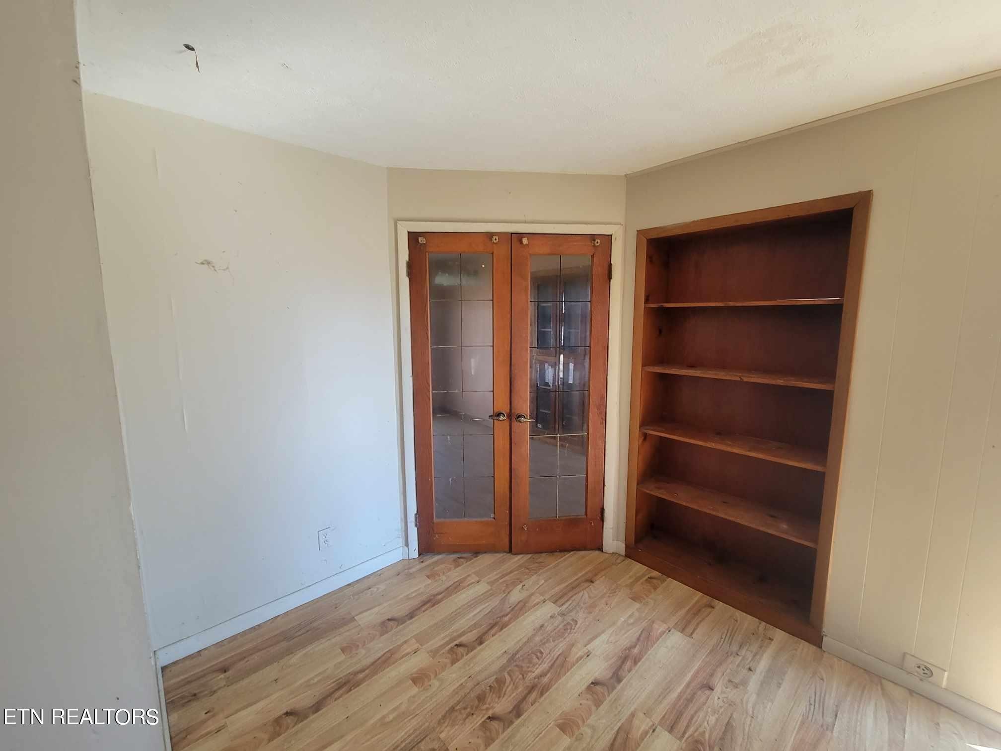1751 Eldridge Loop Crossville, TN 38571 - Photo 20 of 35 a view of an empty room with closet and a window