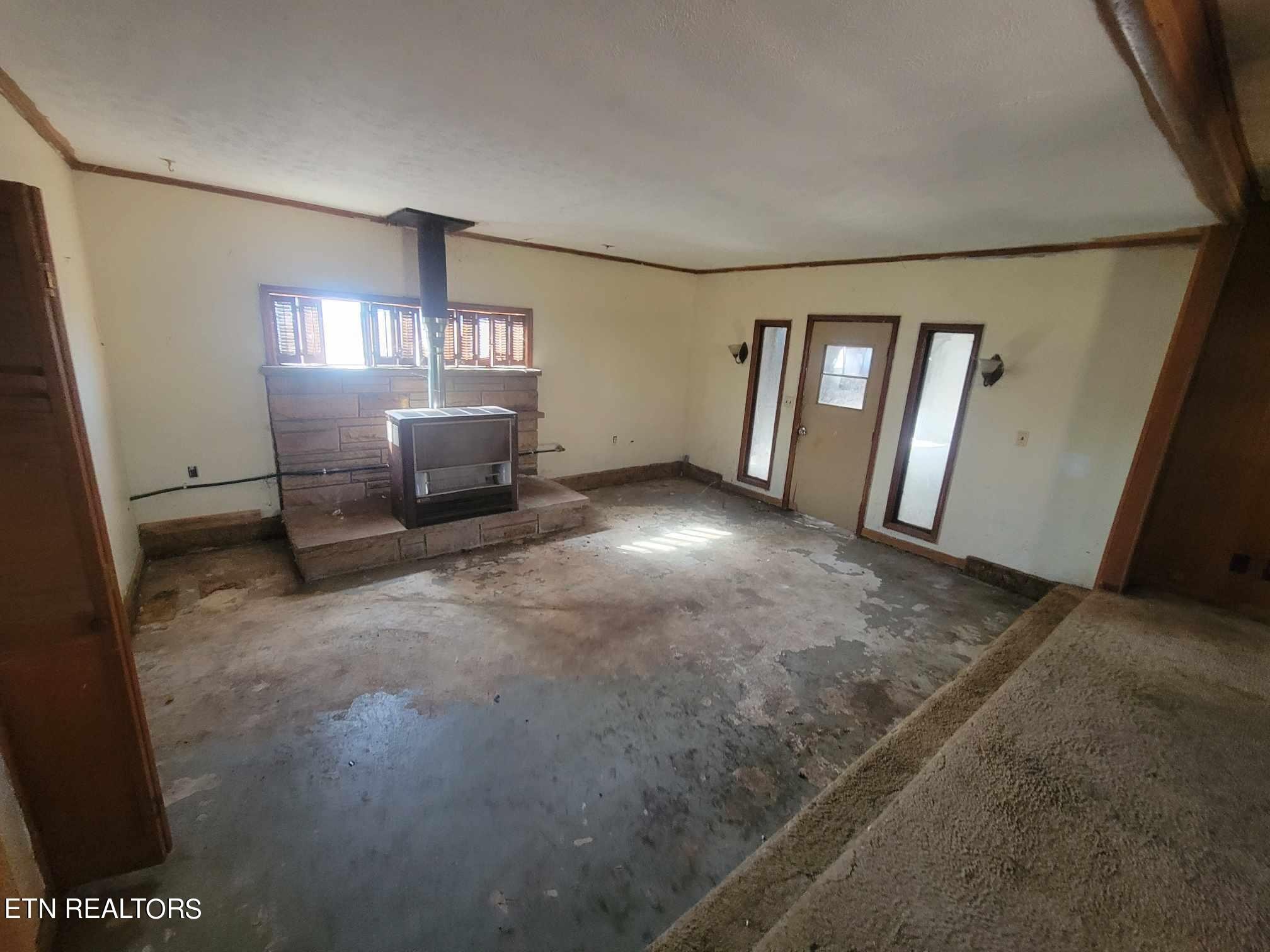 1751 Eldridge Loop Crossville, TN 38571 - Photo 22 of 35 a view of a big room with windows and cabinet
