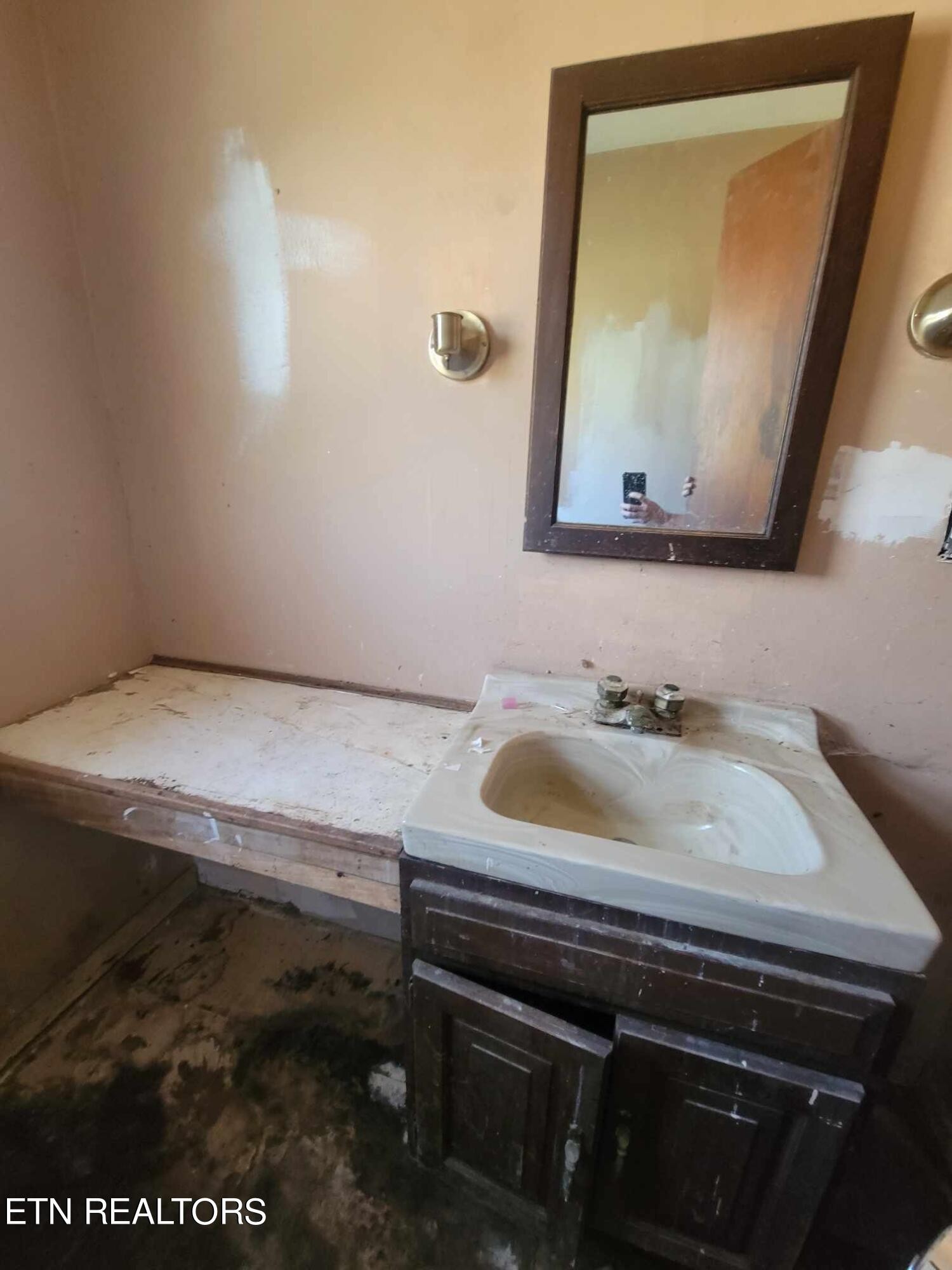 1751 Eldridge Loop Crossville, TN 38571 - Photo 26 of 35 a bathroom with a sink and a mirror