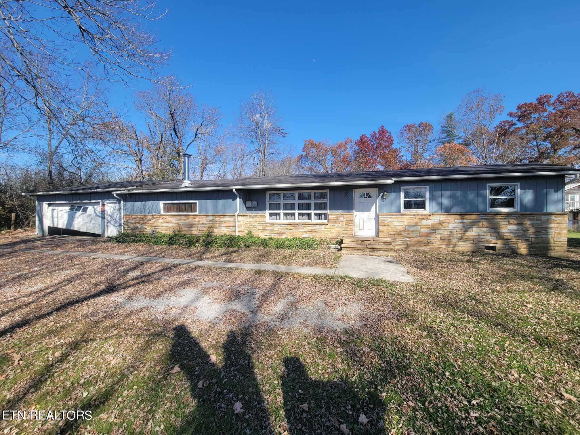 1751 Eldridge Loop Crossville, TN 38571 - Photo 28 of 35 a view of a house with a yard
