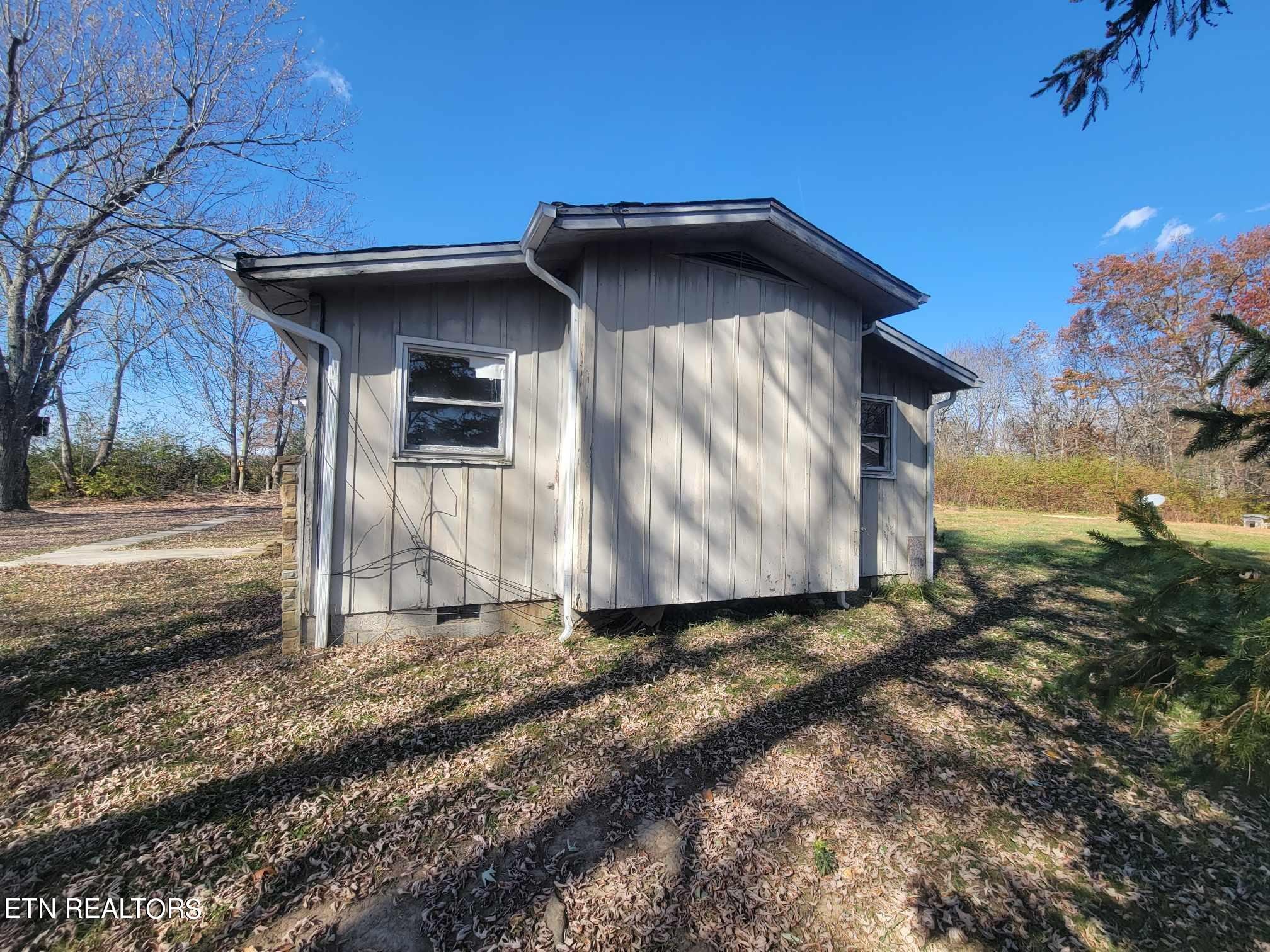 1751 Eldridge Loop Crossville, TN 38571 - Photo 31 of 35 a front view of a house with garden