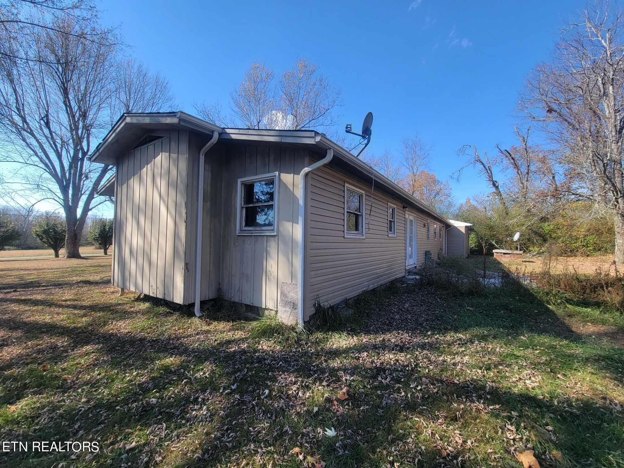 1751 Eldridge Loop Crossville, TN 38571 - Photo 33 of 35 a view of a house with a small yard