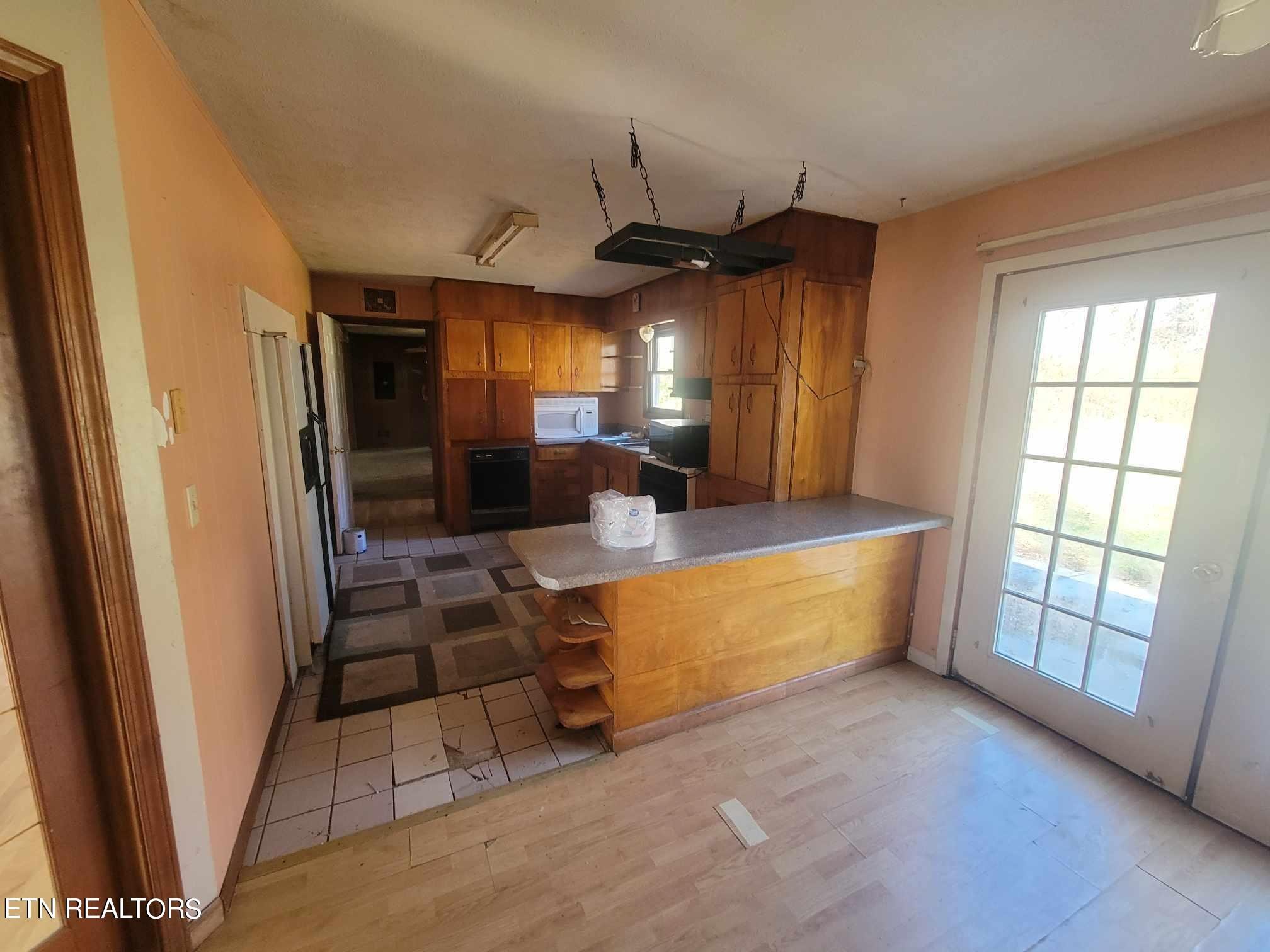 1751 Eldridge Loop Crossville, TN 38571 - Photo 8 of 35 a large living room with large windows