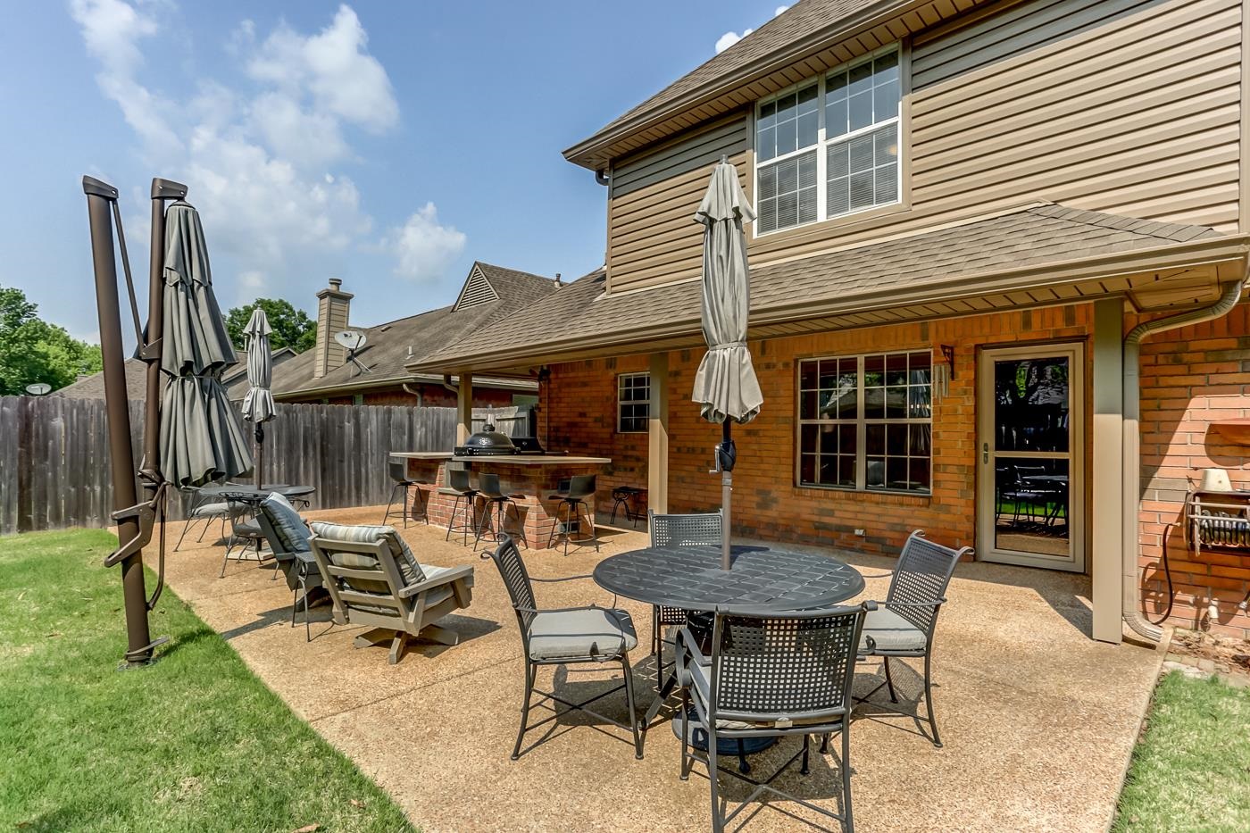 1091 Sugar Lane Collierville, TN 38017 - Photo 23 of 25 a view of patio with table and chairs and potted plants
