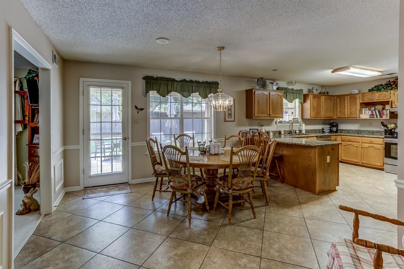 1091 Sugar Lane Collierville, TN 38017 - Photo 3 of 25 a view of a dining room with furniture