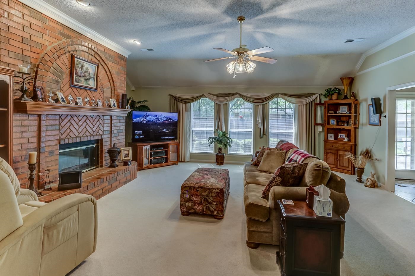 1091 Sugar Lane Collierville, TN 38017 - Photo 4 of 25 a living room with furniture and a fireplace