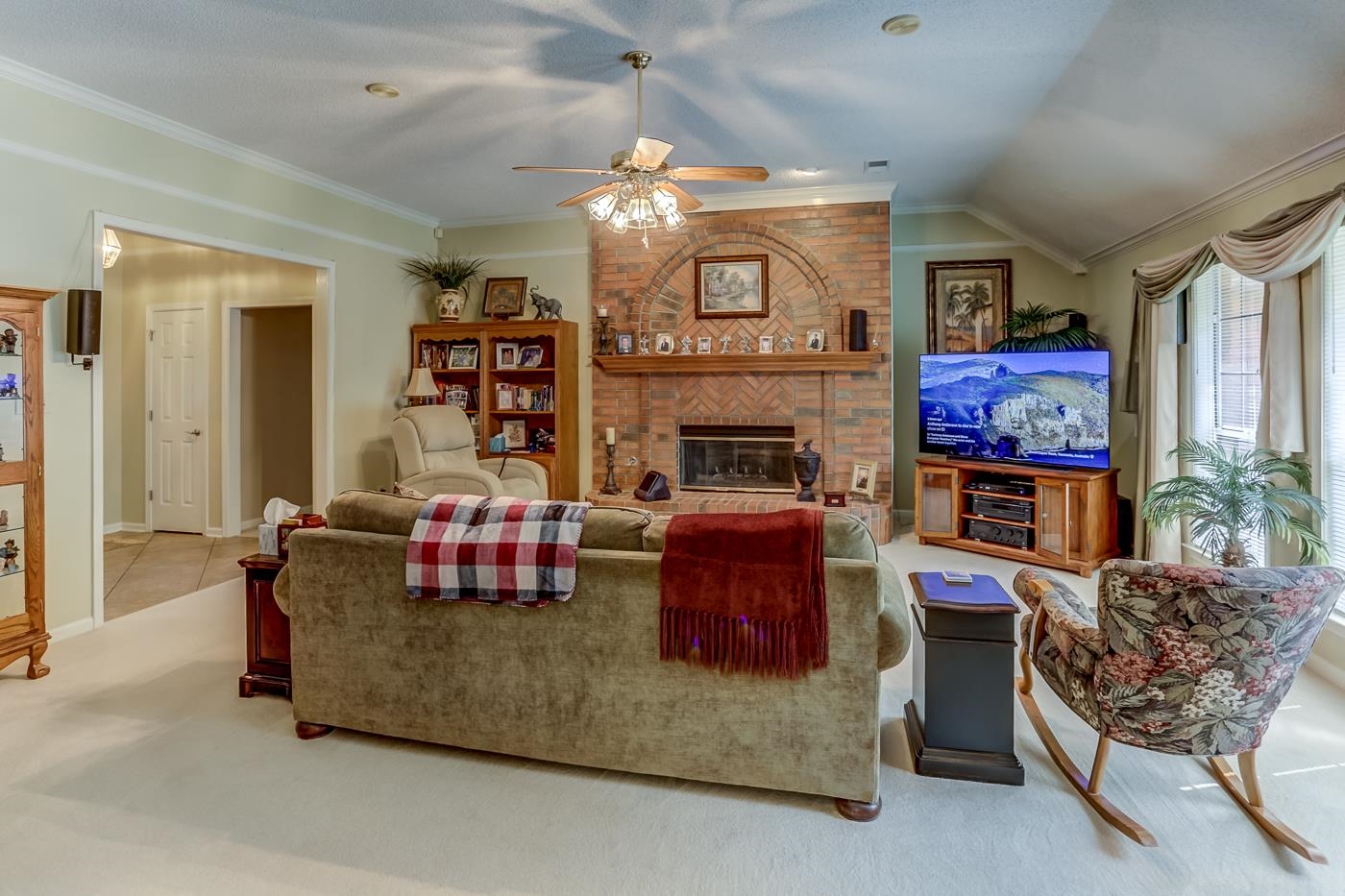 1091 Sugar Lane Collierville, TN 38017 - Photo 9 of 25 a living room with furniture and a fireplace