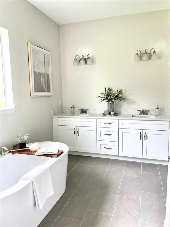 1955 Northwest 79th Loop Ocala, FL 34475 - Photo 8 of 9 a kitchen with a white cabinets and sink