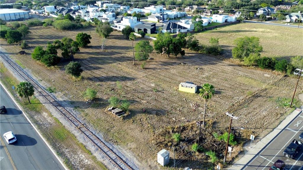 1001 North Shary Road Mission, TX 78573 - Photo 10 of 11 a view of a street with a yard