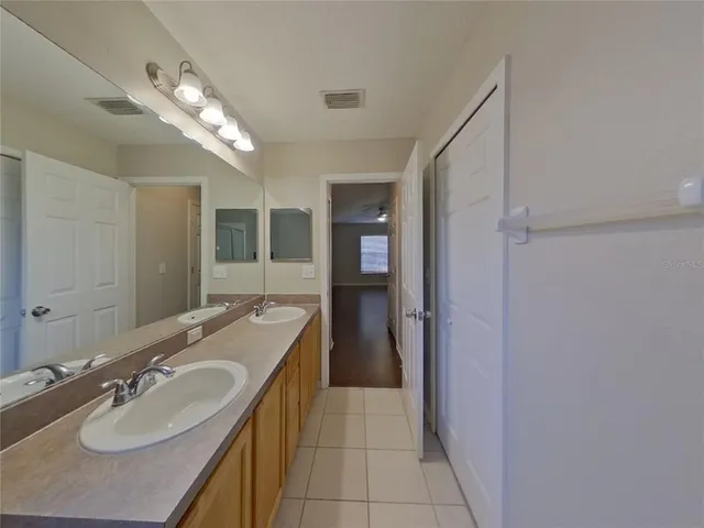 a bathroom with a sink double vanity