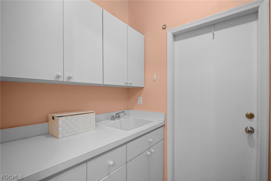 11772 Mahogany Run Fort Myers, FL 33913 - Photo 30 of 50 a view of a storage and utility room with closet