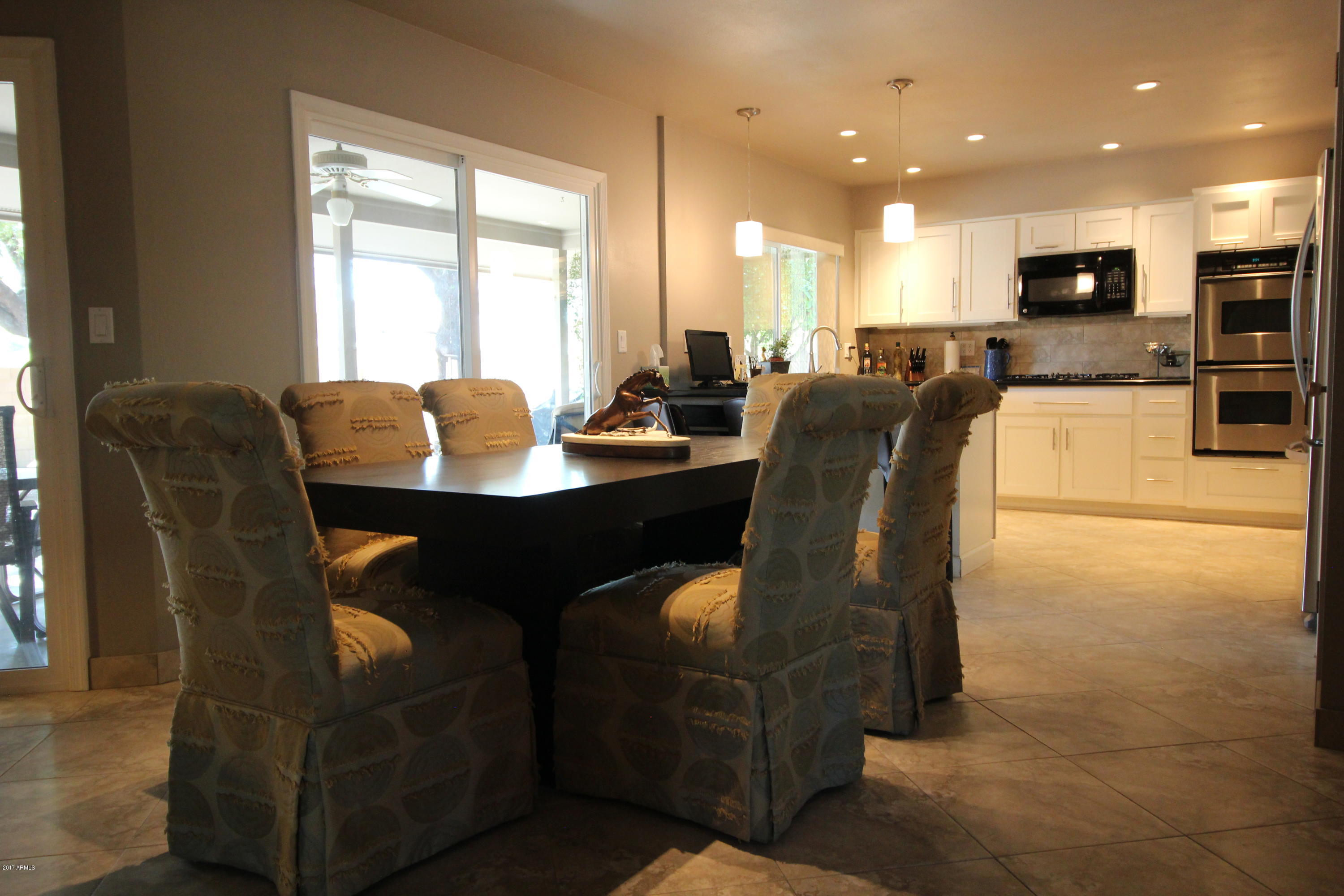 15219 North Ridgeview Road Sun City, AZ 85351 - Photo 6 of 24 Dining Room Toward Kitchen