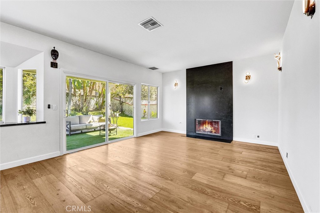 22411 Holly Court Saugus, CA 91390 - Photo 15 of 42 wooden floor in an empty room with a window