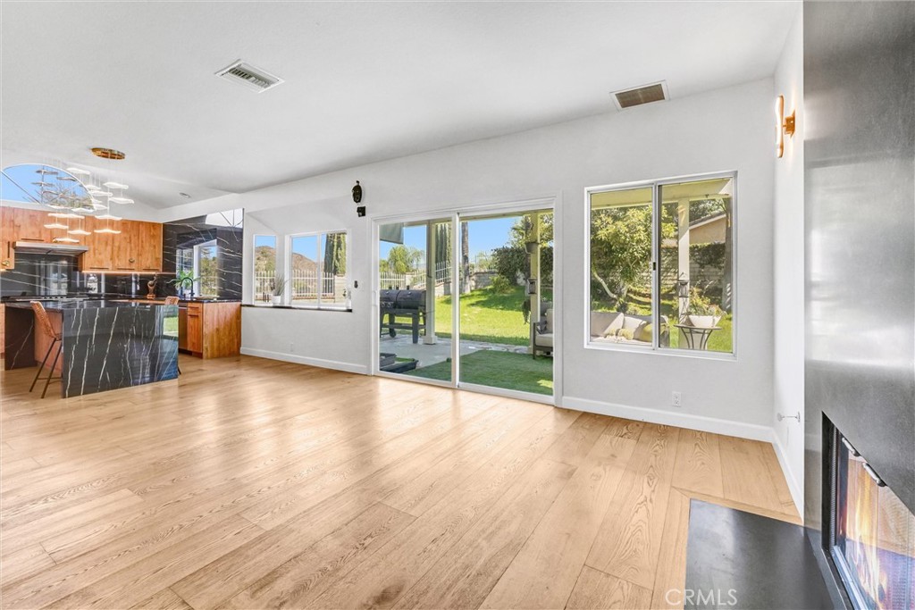22411 Holly Court Saugus, CA 91390 - Photo 16 of 42 a view of a kitchen with furniture and wooden floor