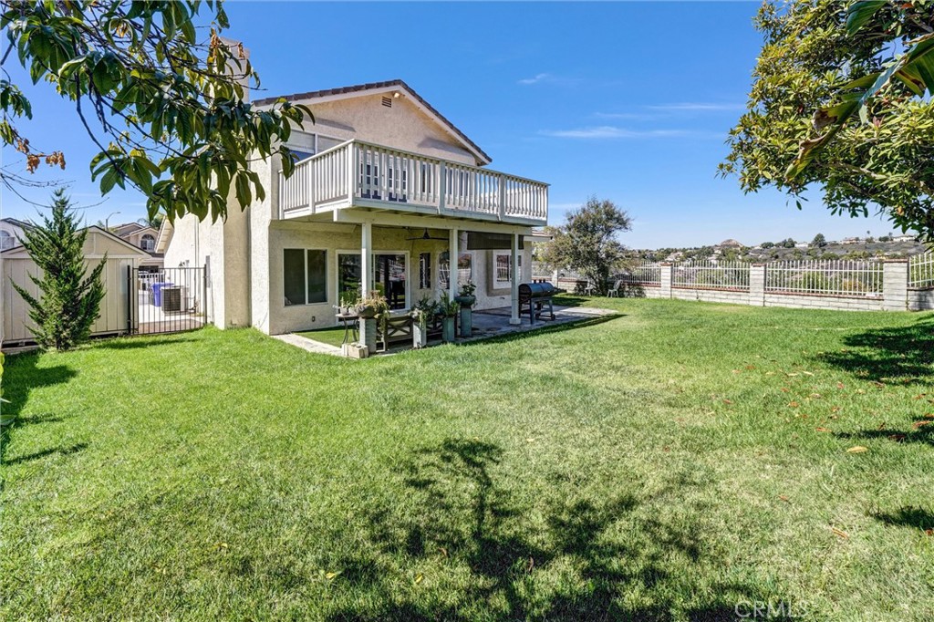 22411 Holly Court Saugus, CA 91390 - Photo 30 of 42 a view of a house with a yard porch and sitting area