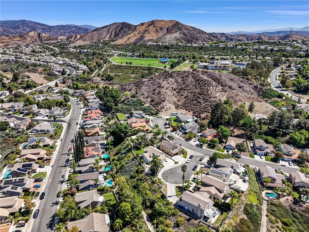 22411 Holly Court Saugus, CA 91390 - Photo 35 of 42 an aerial view of residential house with outdoor space and trees all around