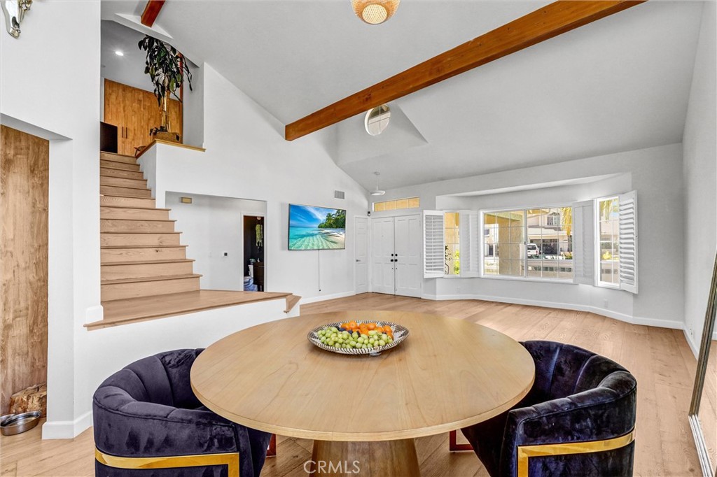 22411 Holly Court Saugus, CA 91390 - Photo 7 of 42 a view of a dining room with furniture and wooden floor