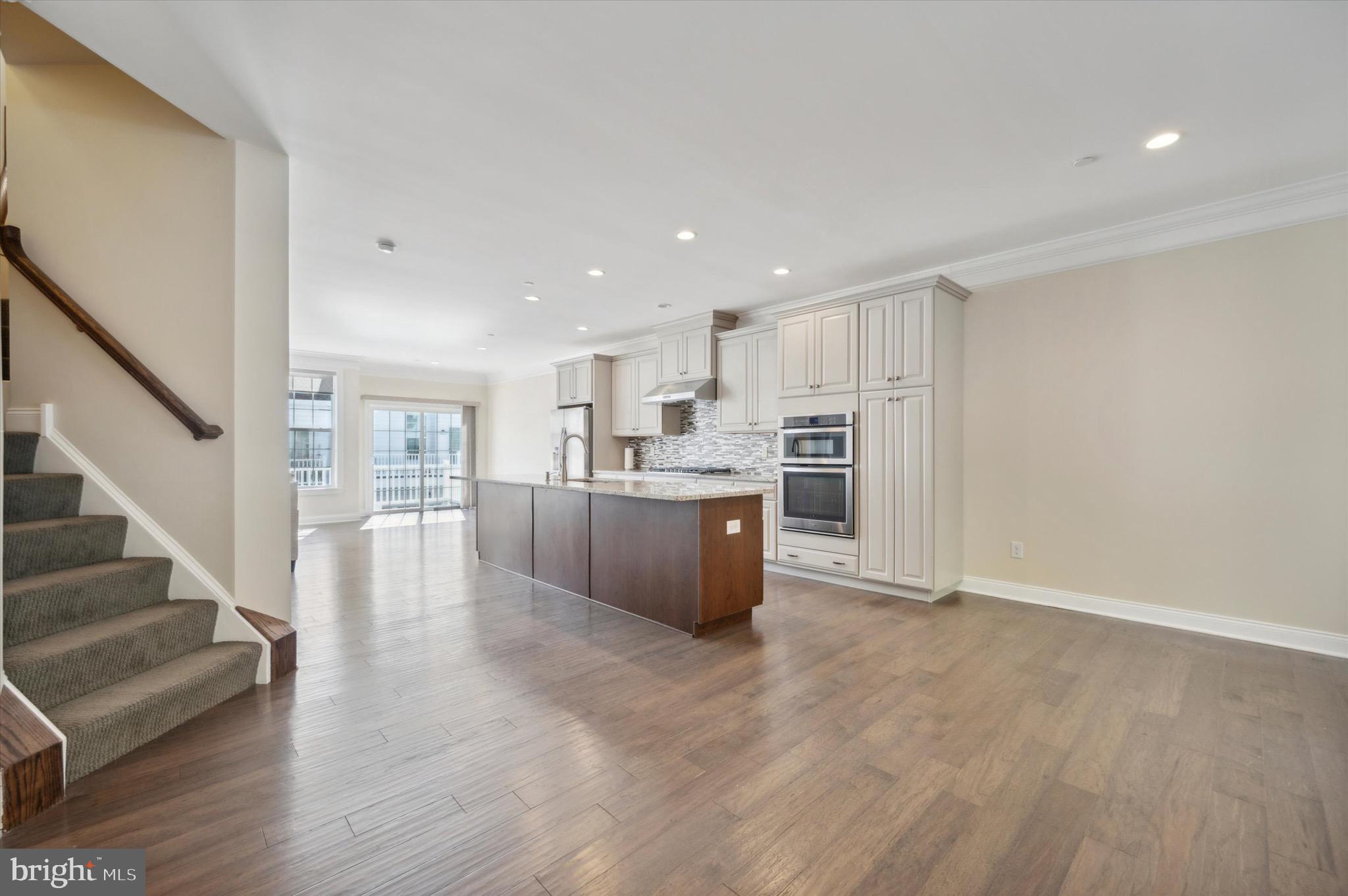 213 Avian Alley Springfield, PA 19064 - Photo 38 of 38 a view of kitchen with wooden floor and electronic appliances