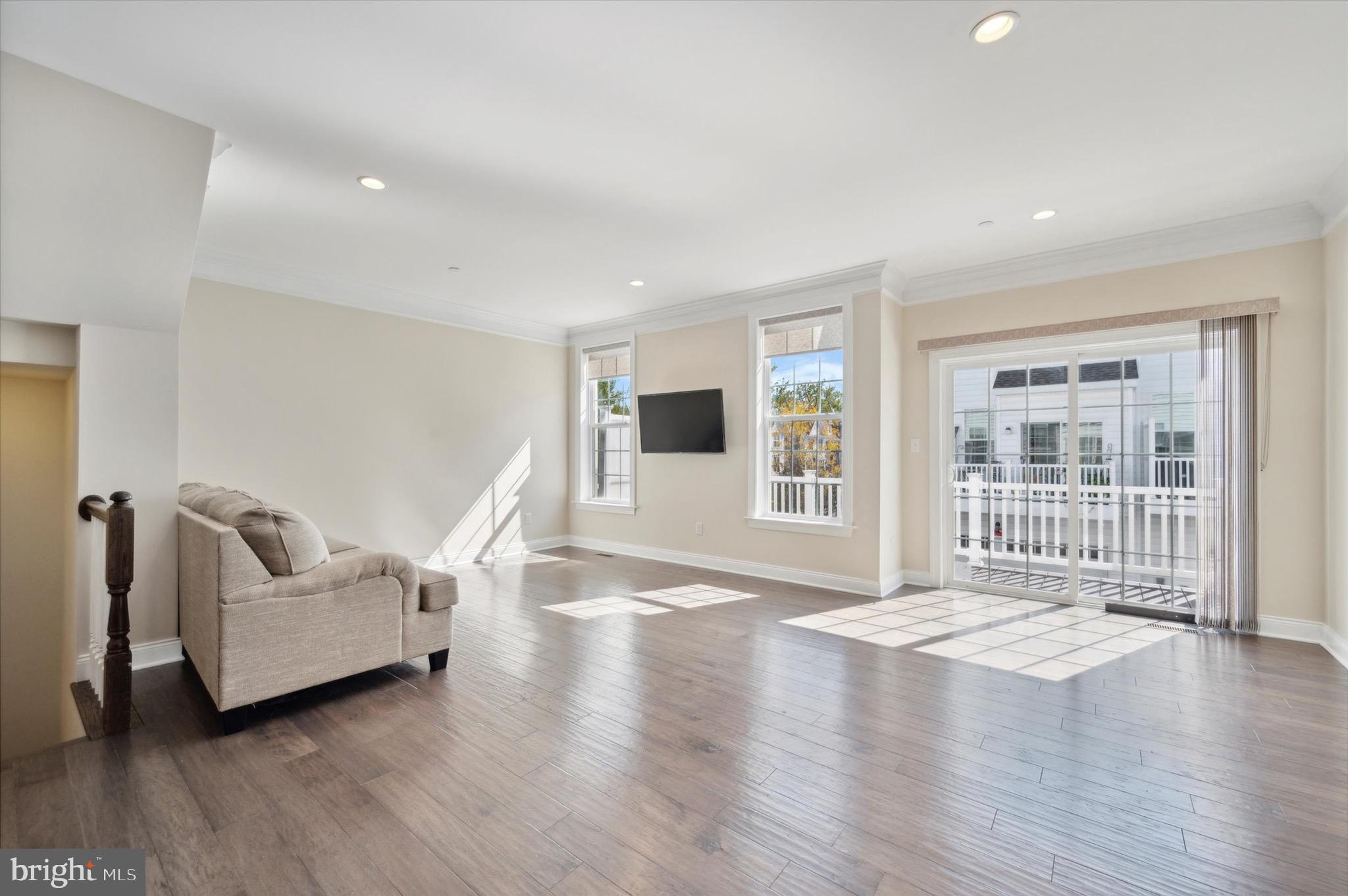 213 Avian Alley Springfield, PA 19064 - Photo 16 of 38 a living room with furniture and a flat screen tv