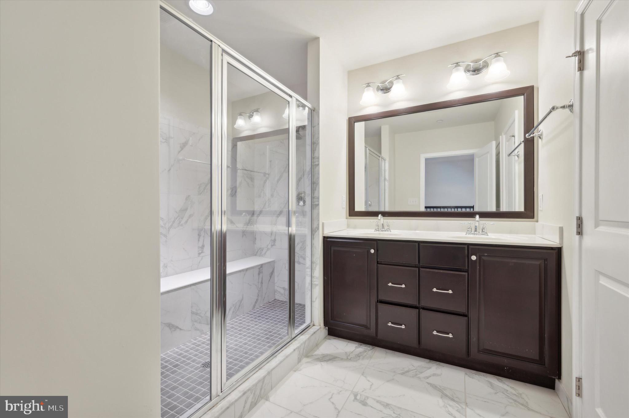 213 Avian Alley Springfield, PA 19064 - Photo 23 of 38 a bathroom with a sink vanity and a mirror