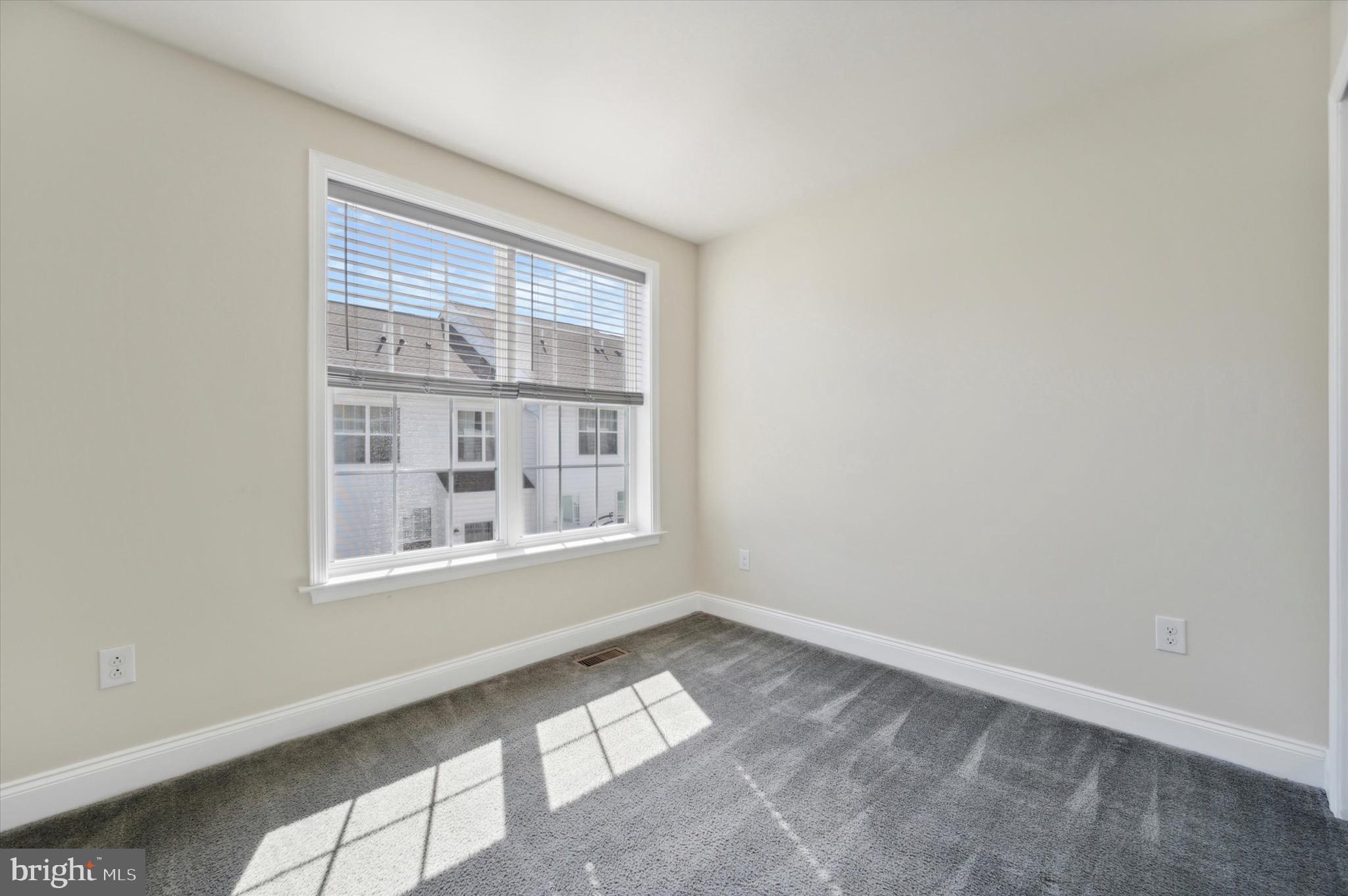 213 Avian Alley Springfield, PA 19064 - Photo 25 of 38 a view of an empty room with a window