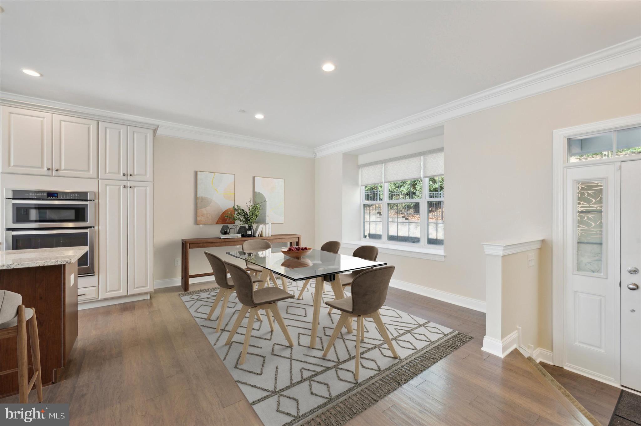 213 Avian Alley Springfield, PA 19064 - Photo 3 of 38 a view of a dining room with furniture window and wooden floor