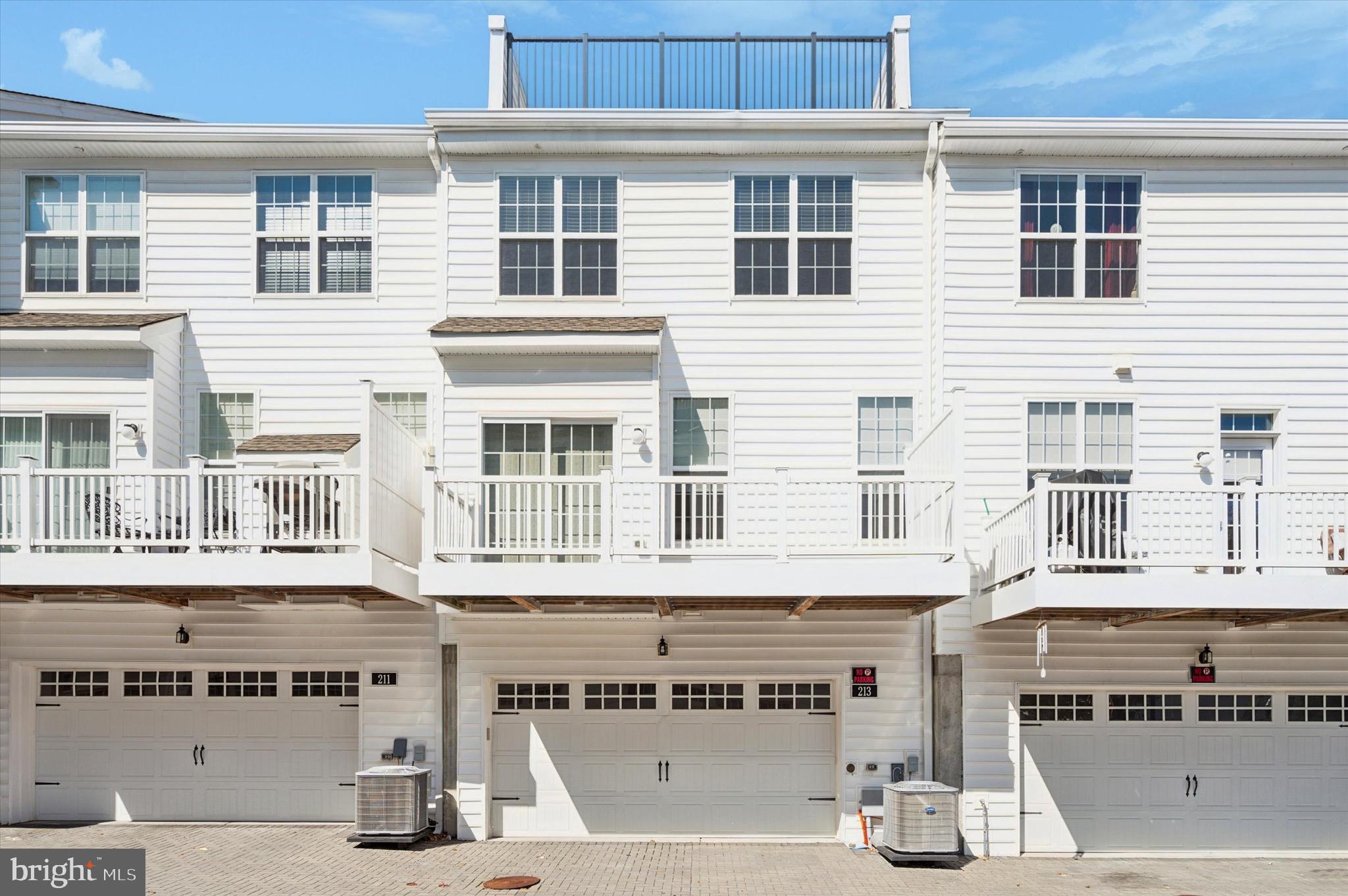 213 Avian Alley Springfield, PA 19064 - Photo 32 of 38 a front view of a building with glass windows