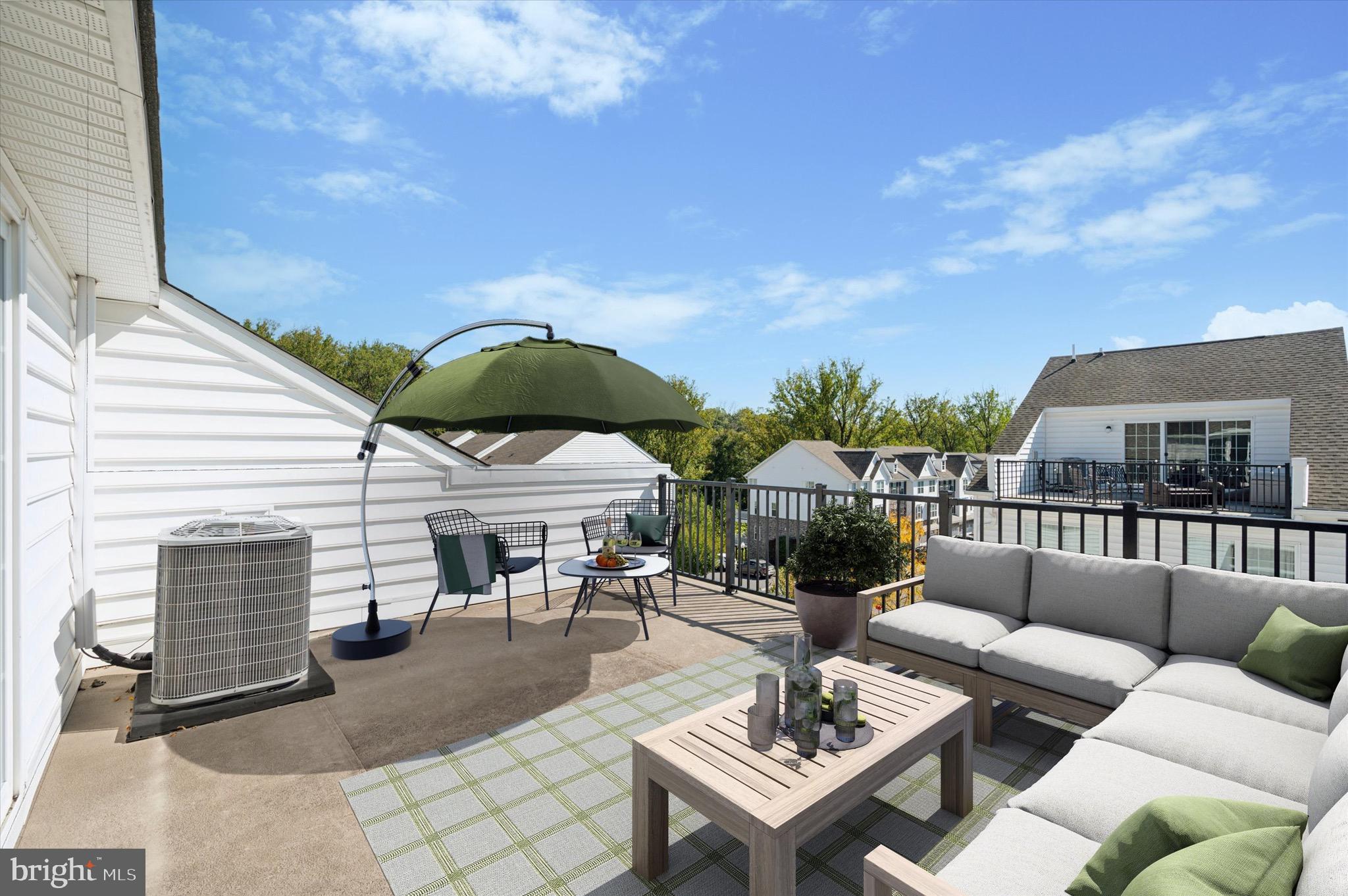 213 Avian Alley Springfield, PA 19064 - Photo 9 of 38 a view of a patio with couches and potted plants