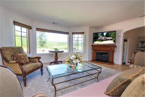 a living room with furniture and a window