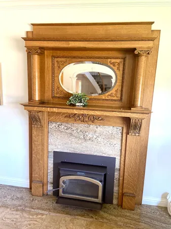 a dining room with furniture a window and wooden floor
