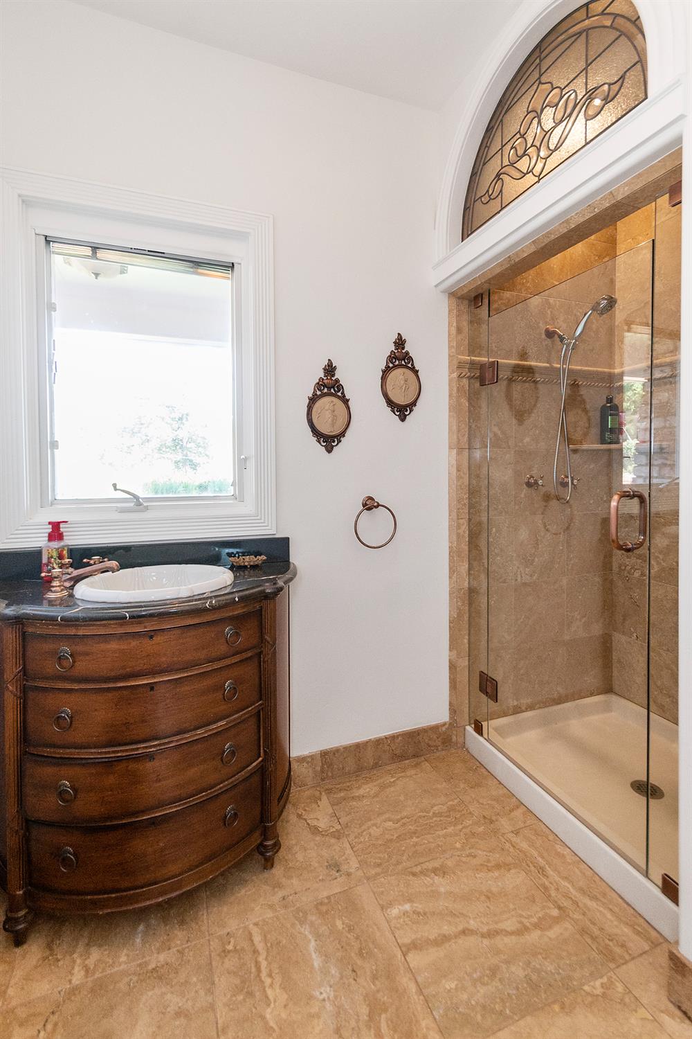2640 Sky Ranch Lane Camino, CA 95709 - Photo 42 of 62 a bathroom with a granite countertop sink mirror bathtub and shower