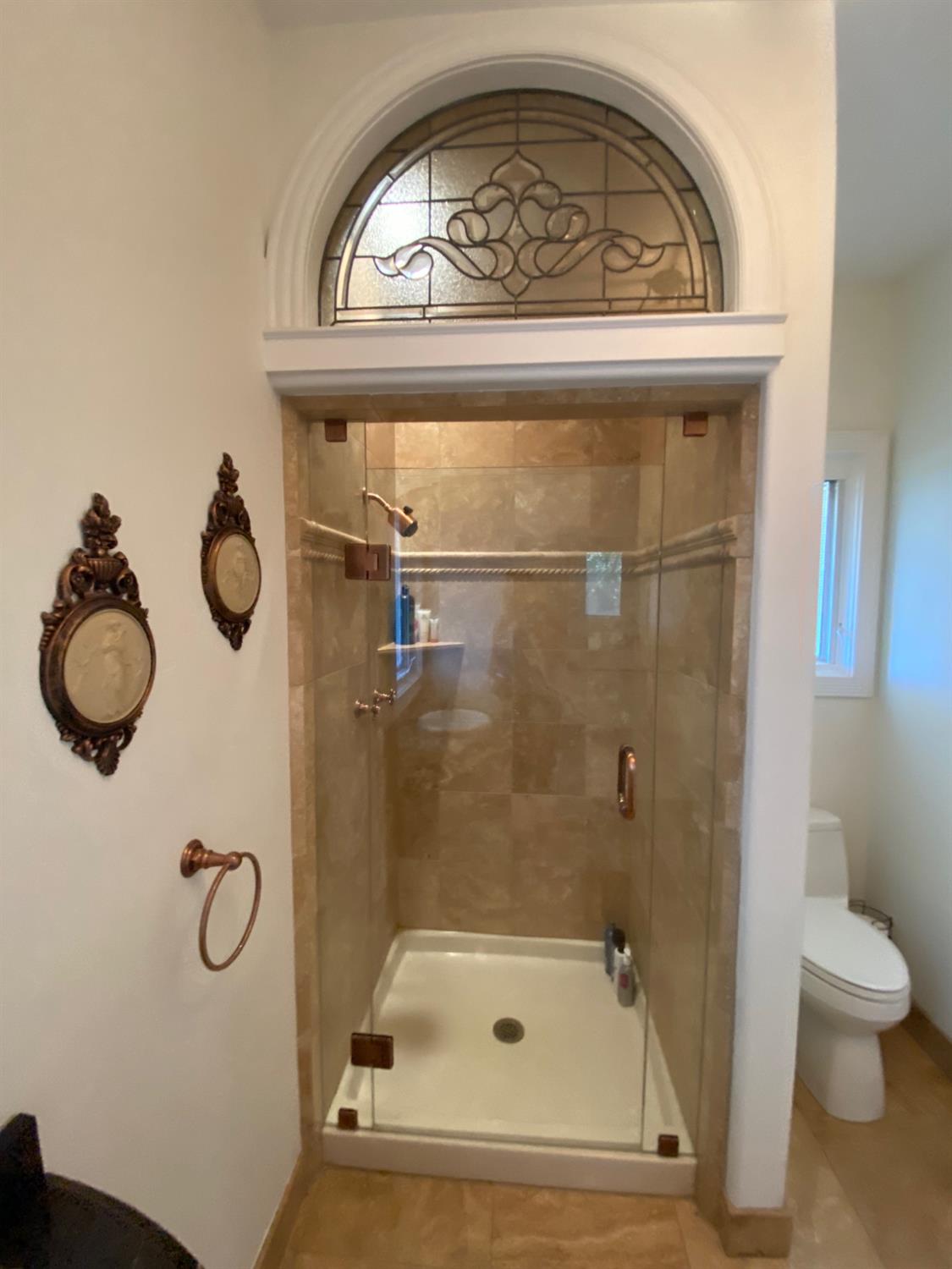 2640 Sky Ranch Lane Camino, CA 95709 - Photo 43 of 62 a bathroom with a granite countertop sink a toilet and shower