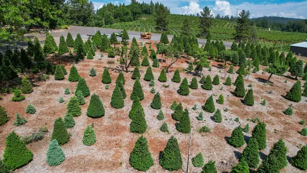 swimming pool view with a seating space