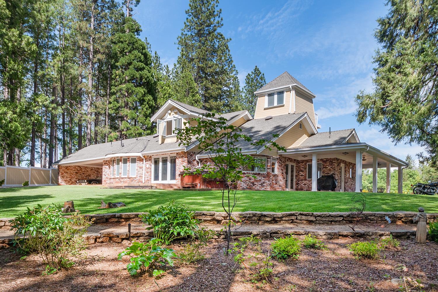 2640 Sky Ranch Lane Camino, CA 95709 - Photo 53 of 62 a front view of a house with a garden