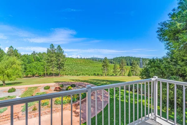 a view of a balcony with an outdoor space
