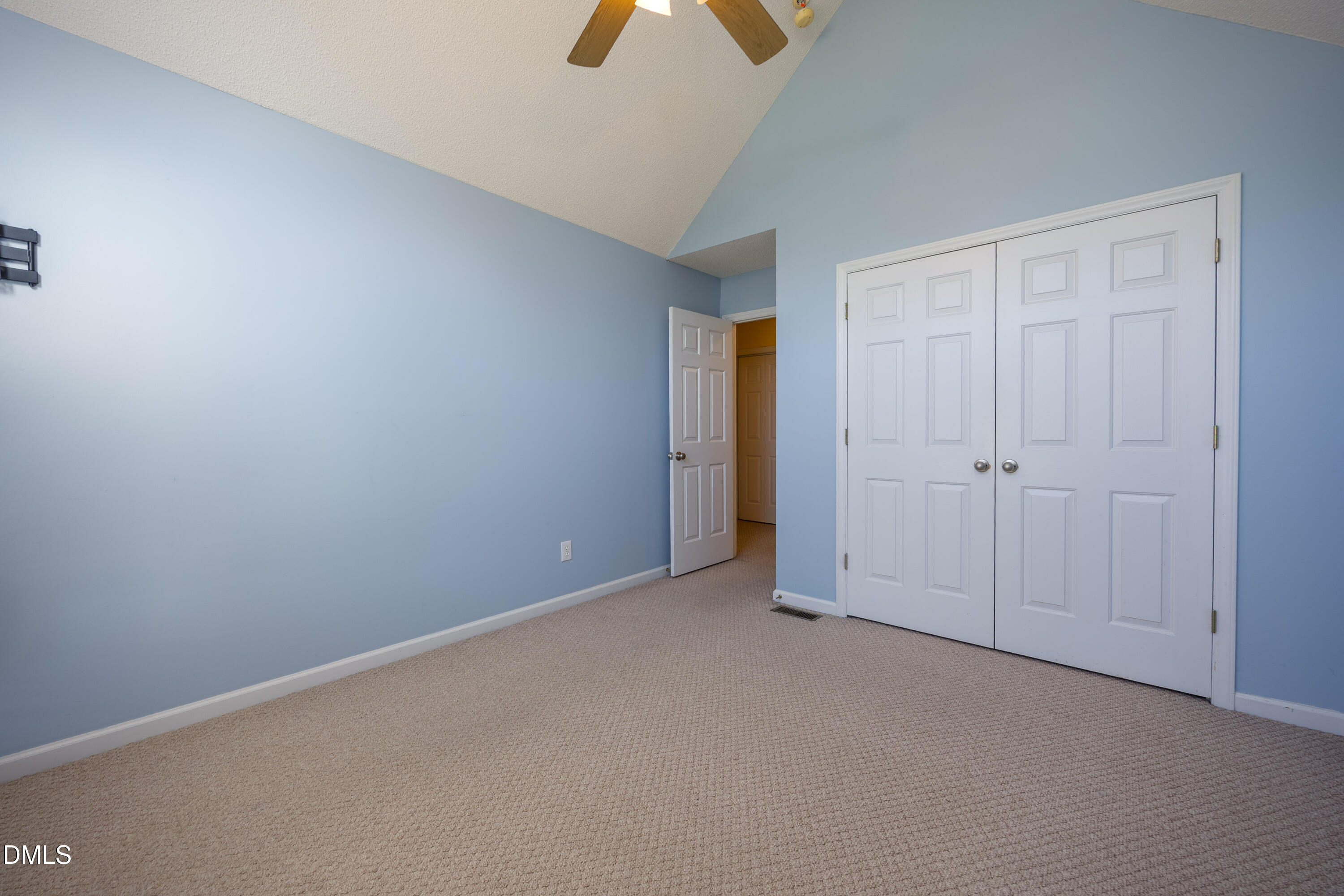 120 Line Drive Raleigh, NC 27603 - Photo 23 of 36 an empty room with chandelier fan